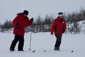 Anna-Lena gives ski lesson to Franco.