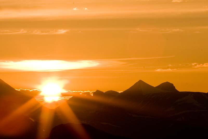 Sunset behind the mountains in Sarek National park.