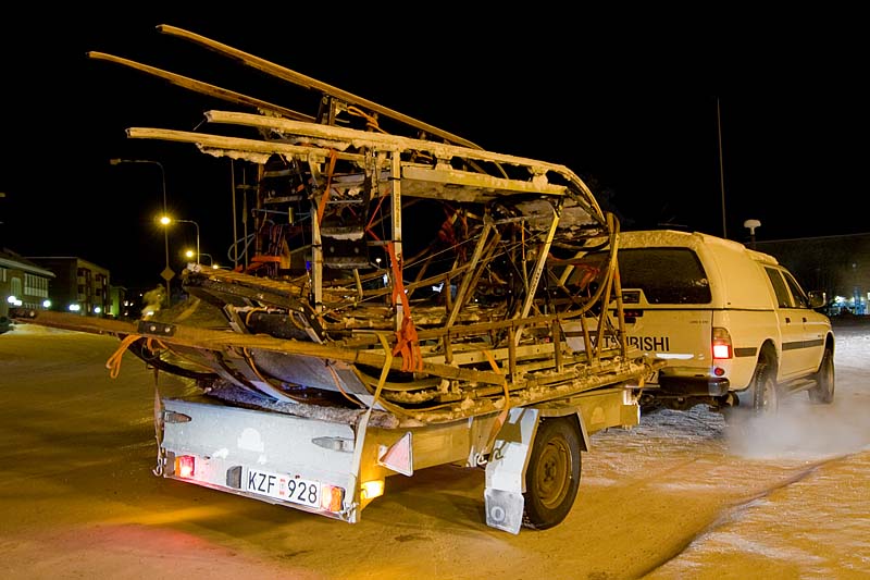 Seven Oinakka sleds of different models are loaded on this trailer.
