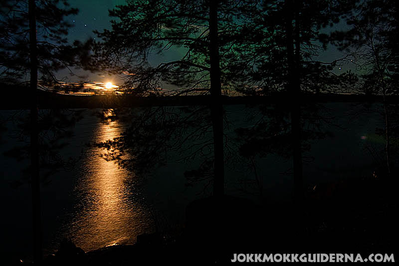 Moonlight and northern lights over lake Skabram