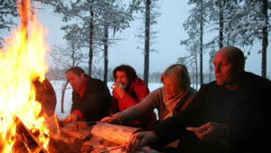 Open fire and outdoor meal. Real life reindeer herding.