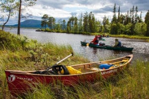 Canoeing in the Pearl river Nature Reserve, Swedish Lapland. Mad river canoes.
