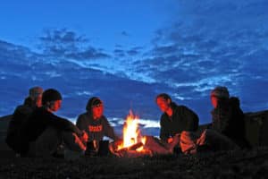 Gather around an open fire in Lapland. Paddle route Jokkmokk to Kvikkjokk