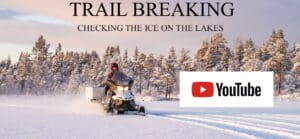 trail breaking with snowmobile and checking the ice on the lakes