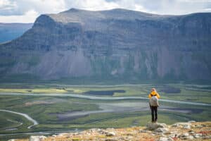The delta of the valley Rapadalen in Sarek Nationalpark. Scouting for moose on the tour: Hiking to mount Skierfe and the gate of Sarek National Park.