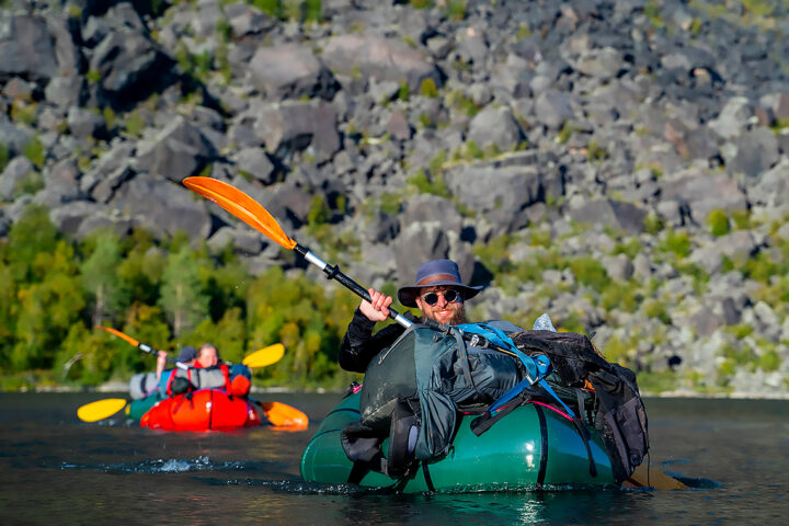 happy paddler on the tour Packraft and Camping tour on the border to Sarek National Park