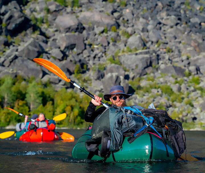 happy paddler on the tour Packraft and Camping tour on the border to Sarek National Park